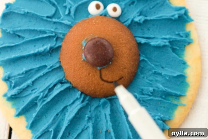 add mouth with edible marker