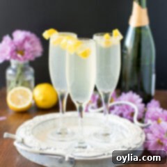 French 75 A Sparkling Classic 4 Three French 75 cocktails garnished with lemon twists