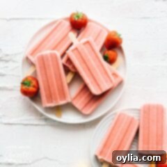 Close-up of frozen strawberry banana popsicles
