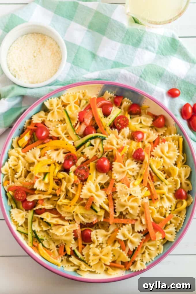 big bowl of pasta primavera on table ready to serve