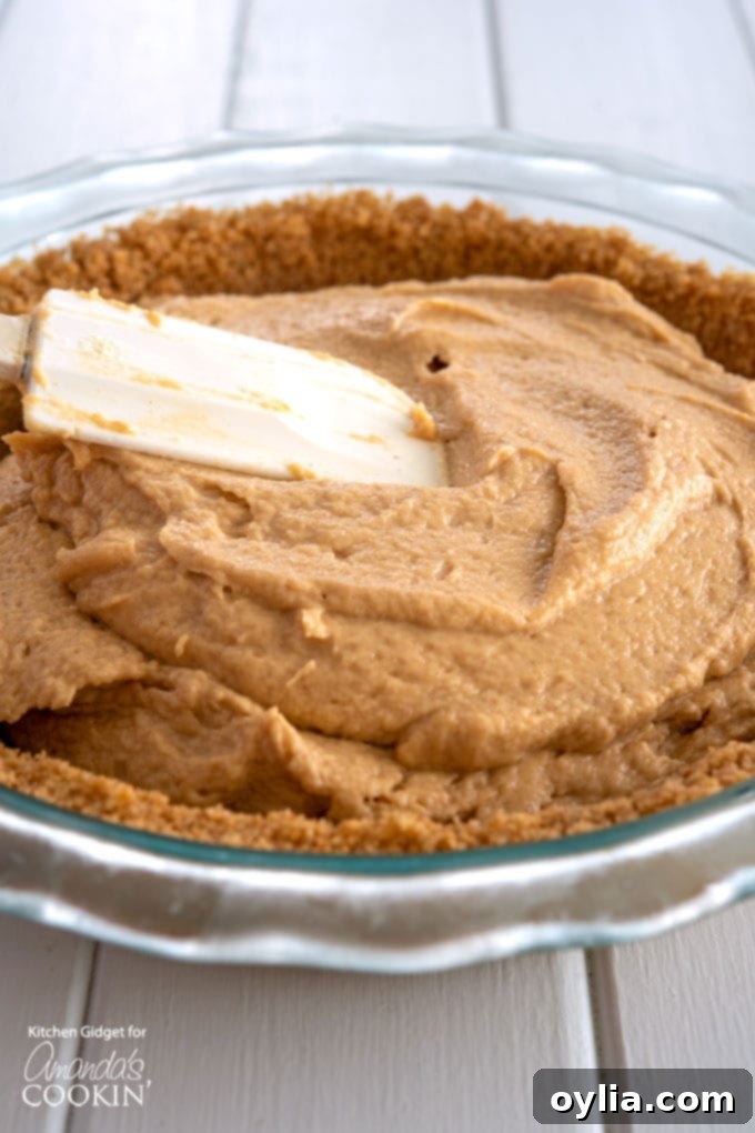 spread peanut butter mixture onto crust