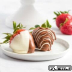 two chocolate covered strawberries