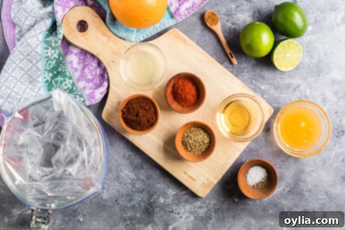 ingredients for chicken tacos laid out on cutting board
