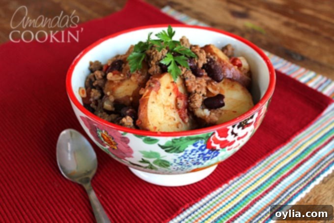 Side view of a bowl of Easy Cowboy Casserole, perfect for a satisfying family meal.