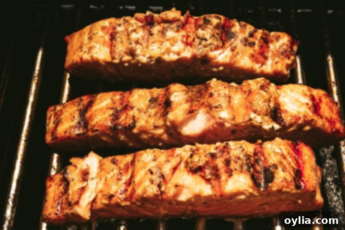 Succulent Grilled Salmon 8 salmon filets cooking on grill