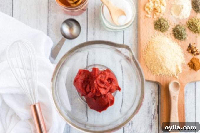 All the essential ingredients laid out for making the best homemade pizza sauce.