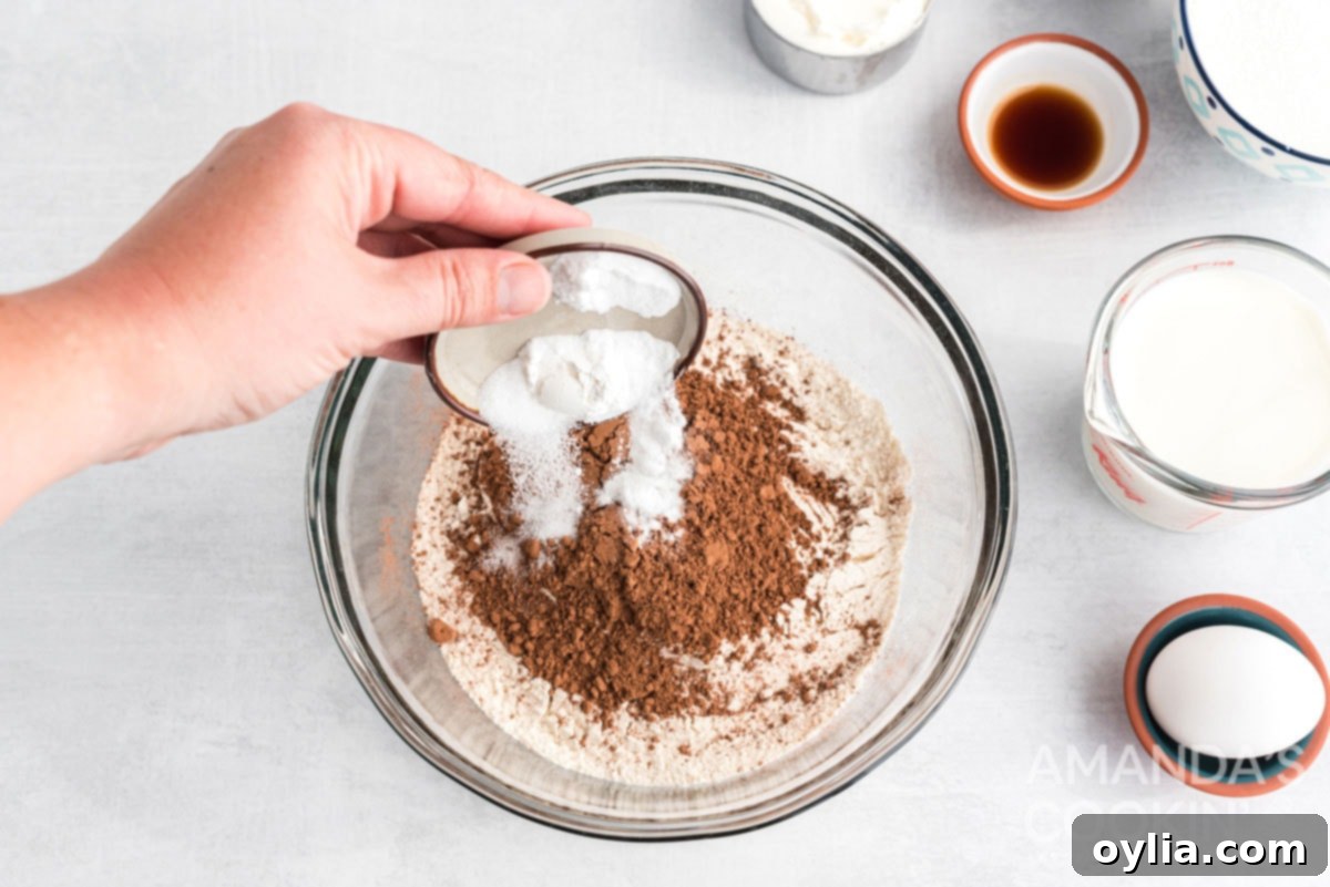 adding baking soda to bowl