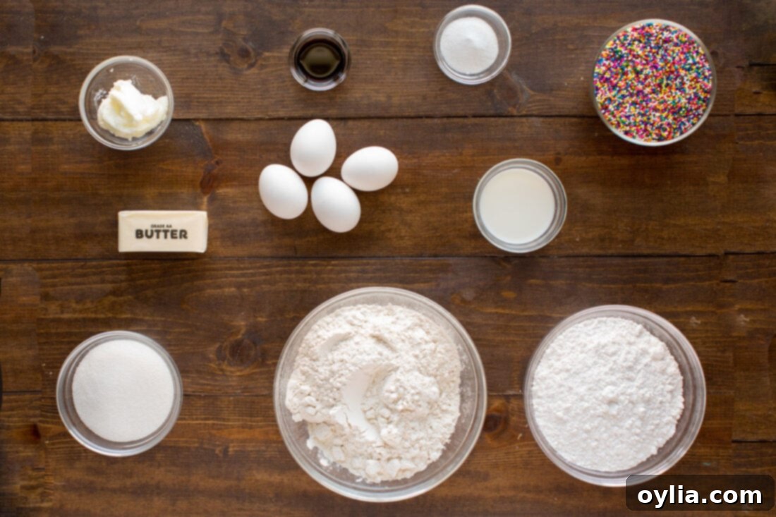 Gather your ingredients to bake these classic Italian anisette cookies, a holiday favorite perfect for any gathering! A flat lay photograph showcasing all the fresh ingredients required to bake delicious Italian Anisette Cookies, including butter, flour, eggs, sugar, and anise extract, neatly arranged on a rustic surface.