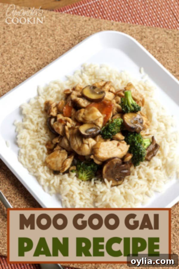 A plate of chicken and Moo Goo Gai Pan with rice and broccoli