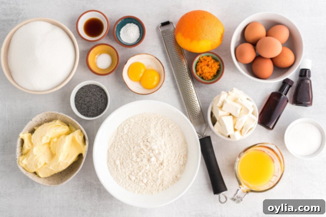 ingredients for Orange Poppy Seed Pound Cake laid out on a surface
