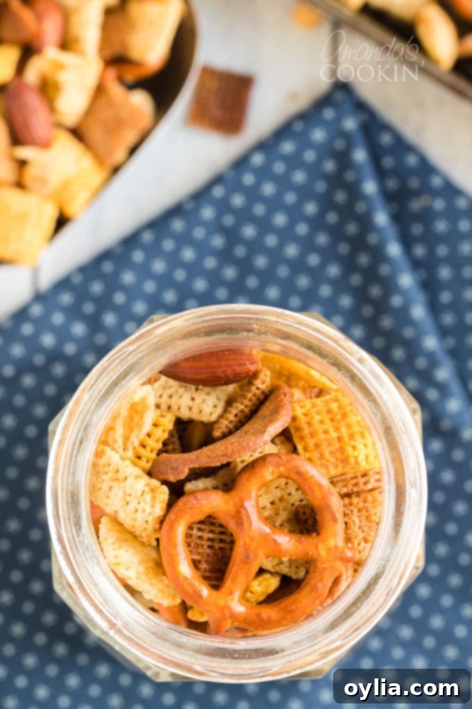 overhead view of chex mix in a jar