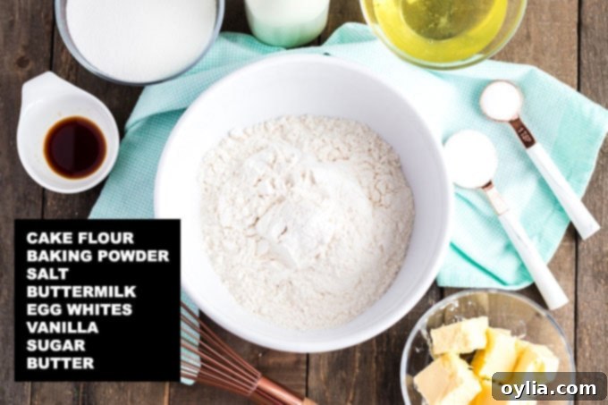 Timeless Vanilla Cake 2 labeled ingredients for white cake recipe: cake flour, baking powder, salt, buttermilk, egg whites, vanilla, sugar, butter