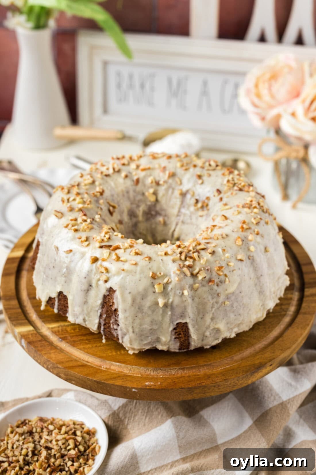 Banana Bundt Cake on a wooden cake stand