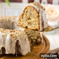 Slice of Banana Bundt Cake held up on a pie server
