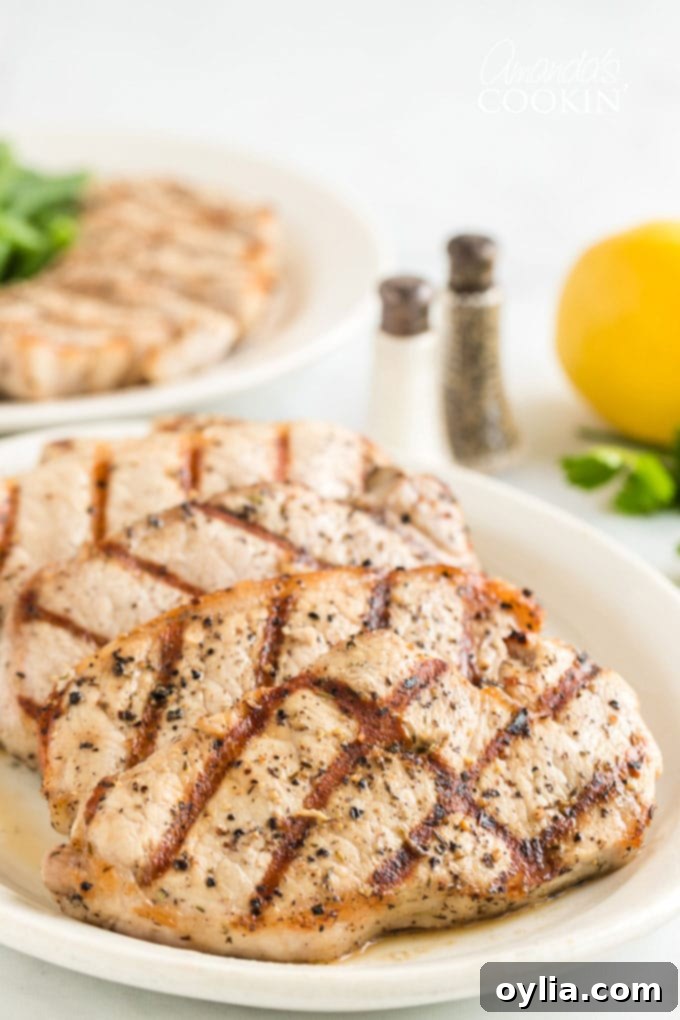 grilled pork chops on a platter