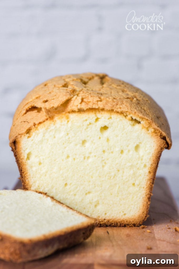 whipping cream pound cake with a slice out of it
