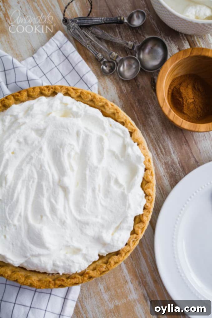 A whole pumpkin pie with a golden crust