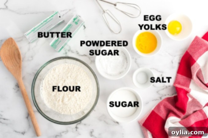 Shortbread cookie ingredients laid out: butter, sugars, salt, egg yolks, flour
