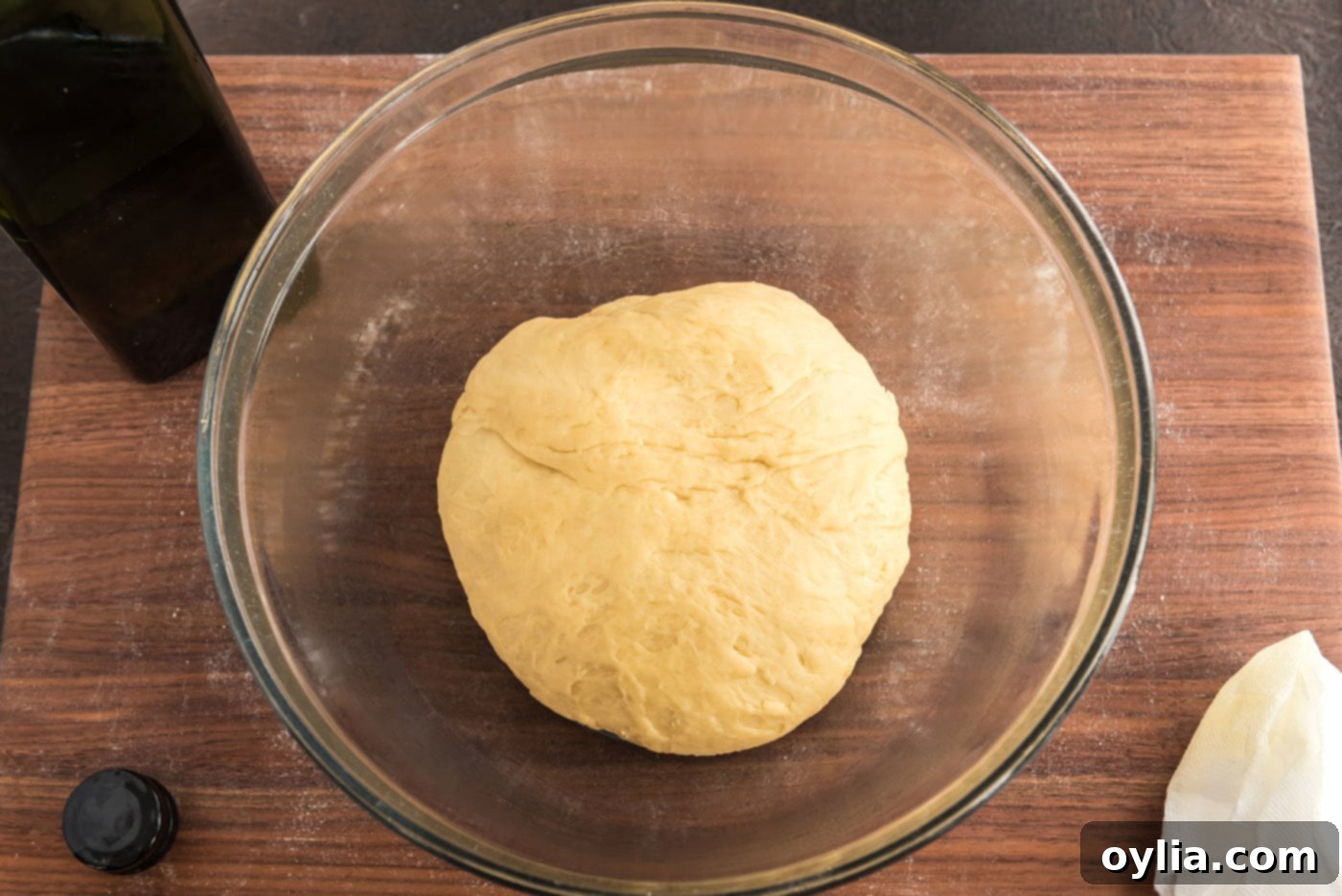 yeast dough ball in a bowl