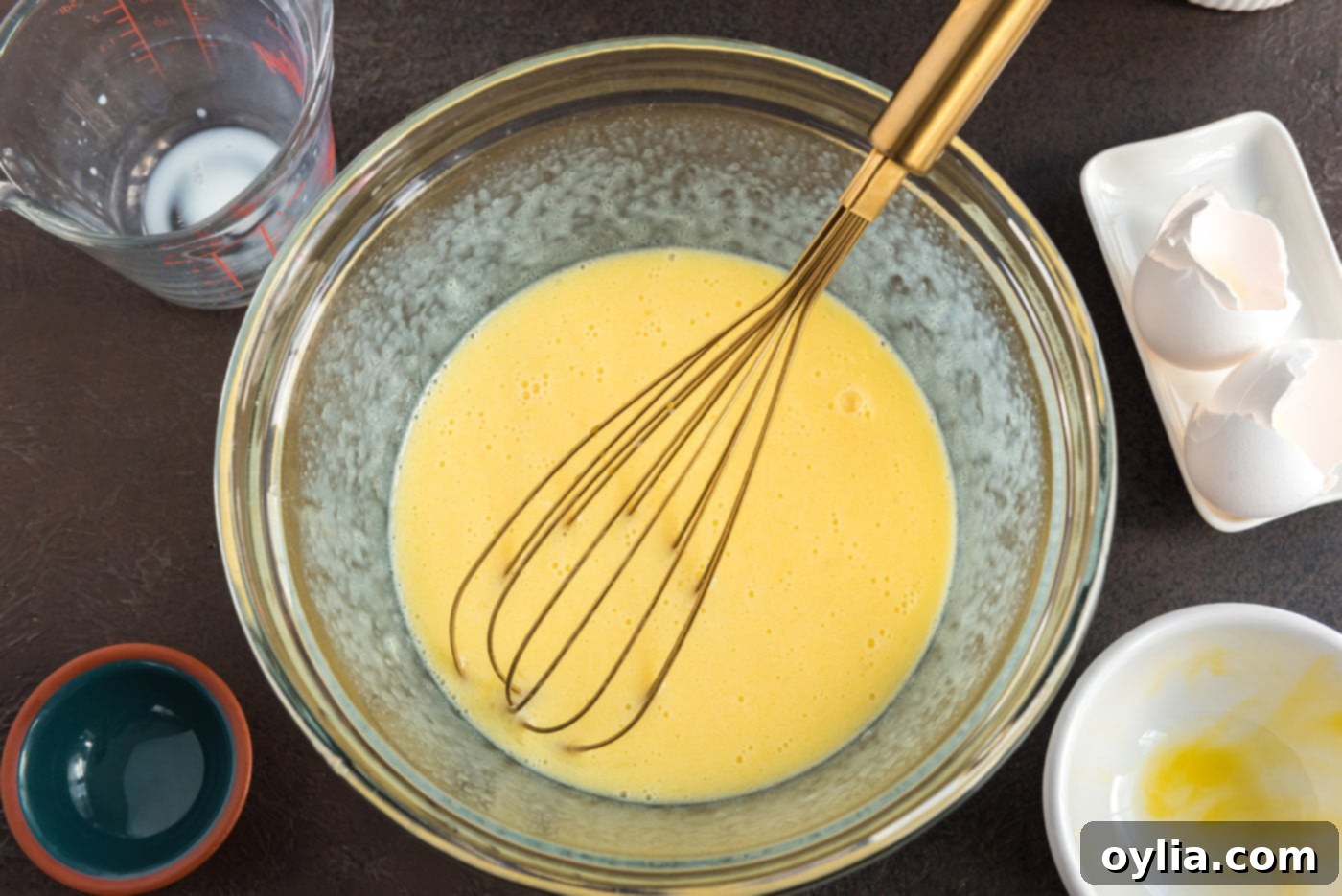 whisked butter, milk, and egg in bowl