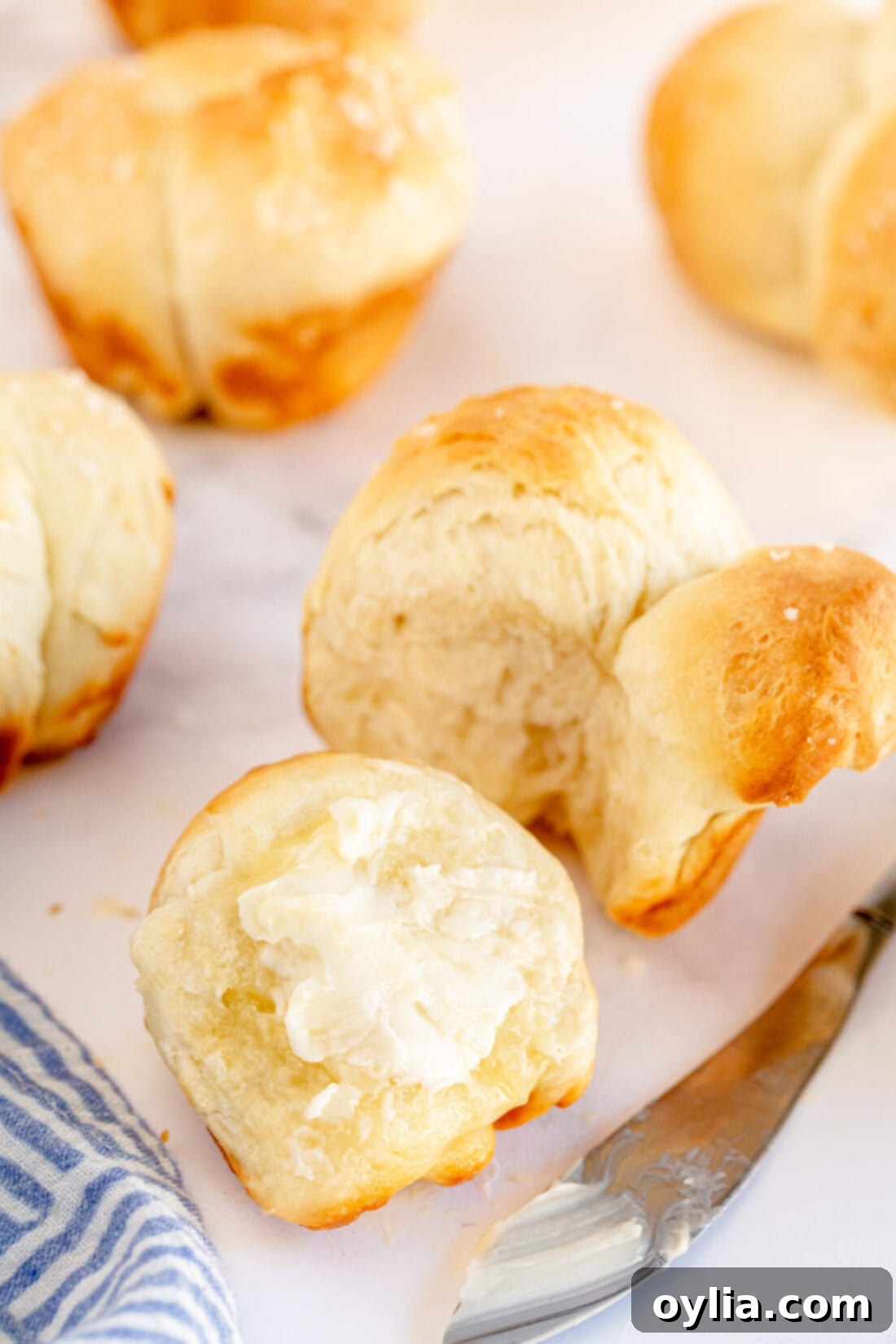 butter on a Homemade Pull Apart Dinner Roll