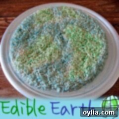 Earth Day Edible Rice Krispy Treats 2 A photo of an edible earth cake resting on a plate. This Rice Krispy treat is shaped and colored like a globe, ready to be enjoyed as a fun Earth Day dessert.