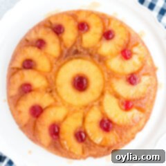 pineapple upside down cake on a white plate