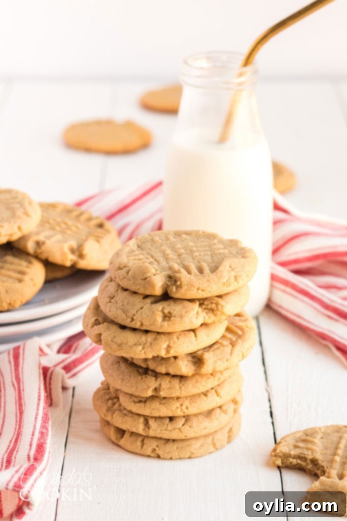 Stack of perfectly soft and chewy homemade peanut butter cookies, ready to be enjoyed.