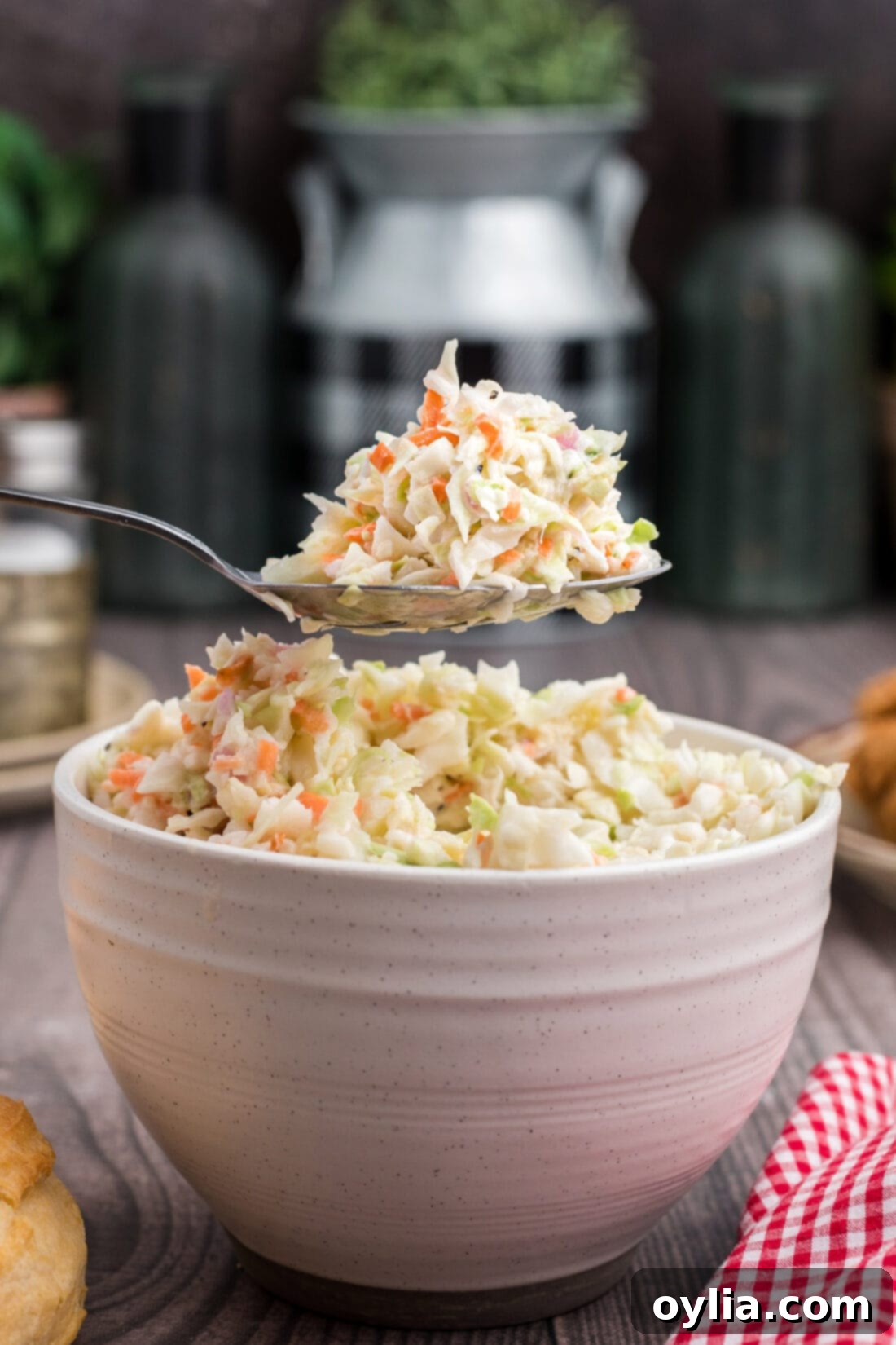 A spoonful of creamy, fresh KFC copycat coleslaw, ready to be enjoyed.