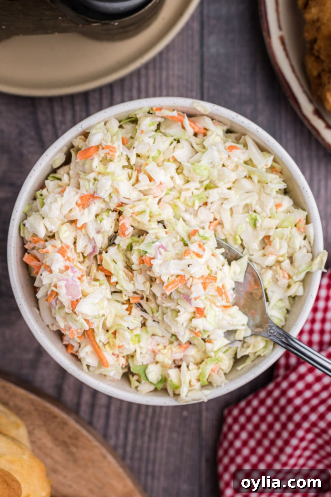 Overhead view of a large bowl of creamy, delicious homemade KFC coleslaw.