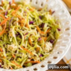 Delicious and vibrant Asian broccoli slaw in a serving bowl, highlighting its fresh ingredients and appealing texture.