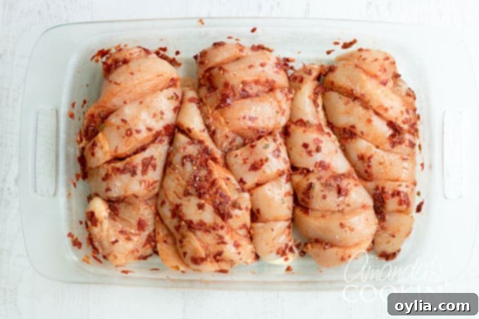 Step-by-step: Thoroughly rub the chile lime marinade onto the chicken.