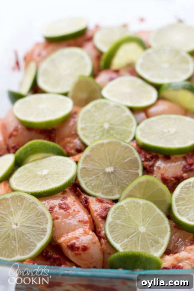 Step-by-step: Arrange lime slices over the marinated chicken for extra flavor and visual appeal.