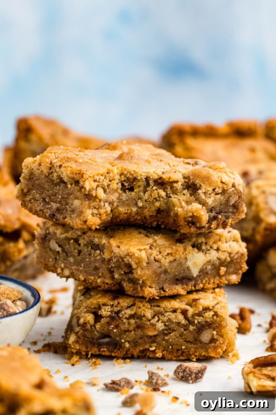 Stack of three Brown Butter Chocolate Toffee Blondies
