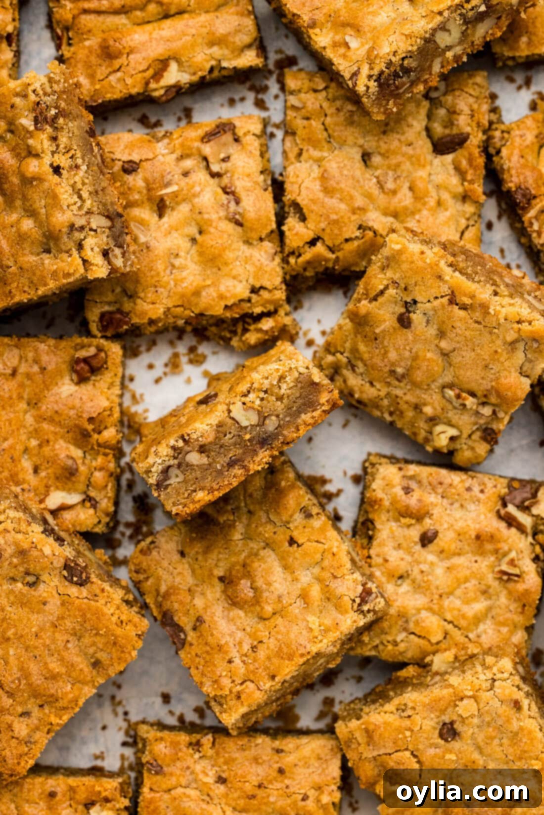 Brown Butter Chocolate Toffee Blondies piled on top of each other