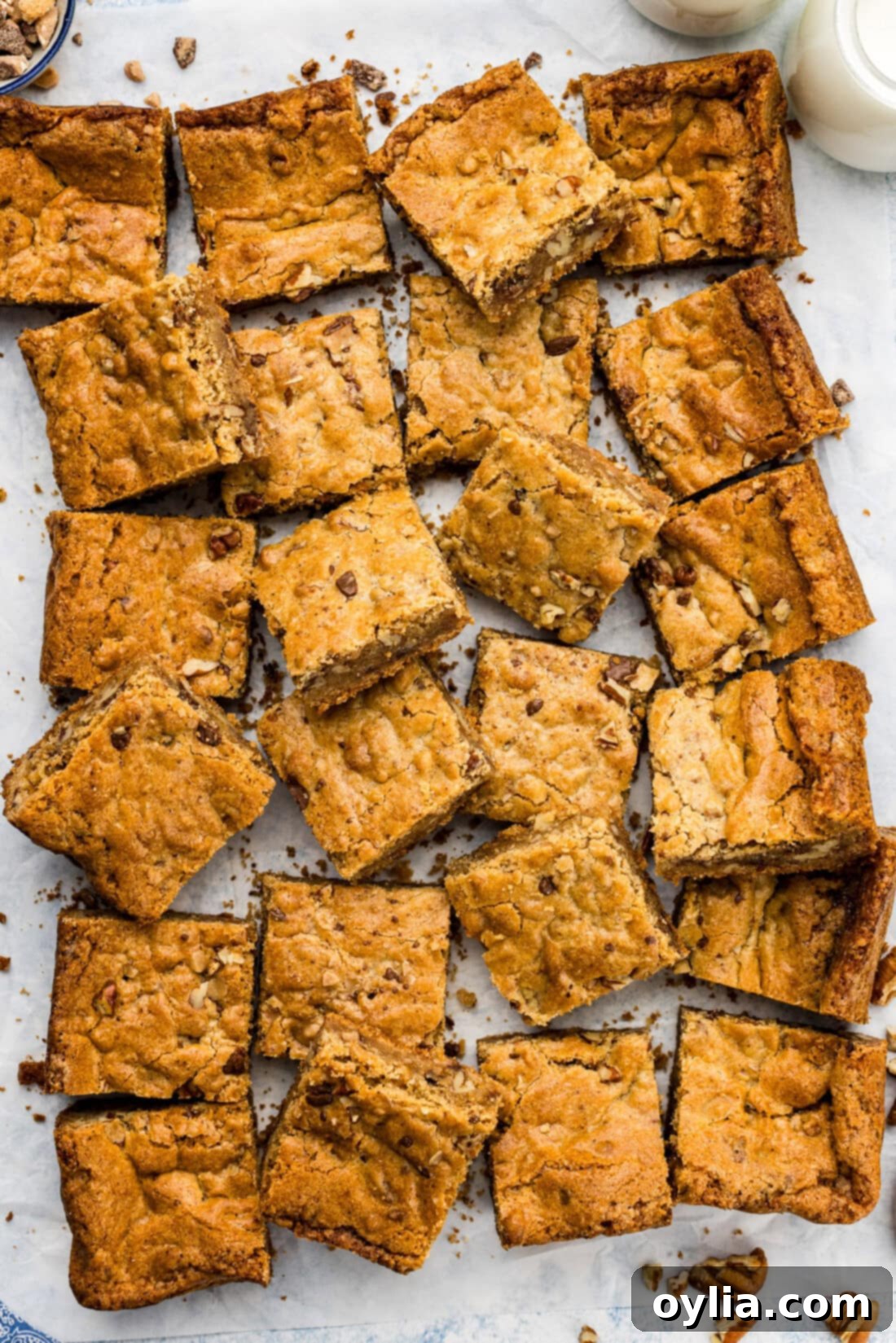 Brown Butter Chocolate Toffee Blondies cut up on parchment paper