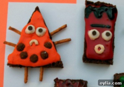 Detailed close-up of a blue monster brownie with a large Cheerio eye and Trix cereal spots