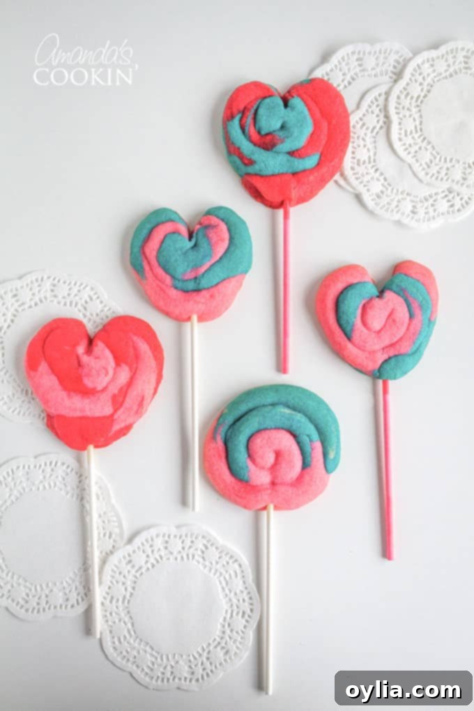 A lovely assortment of colorful Valentine Play Dough Cookie Pops, showcasing different color combinations and their inviting texture