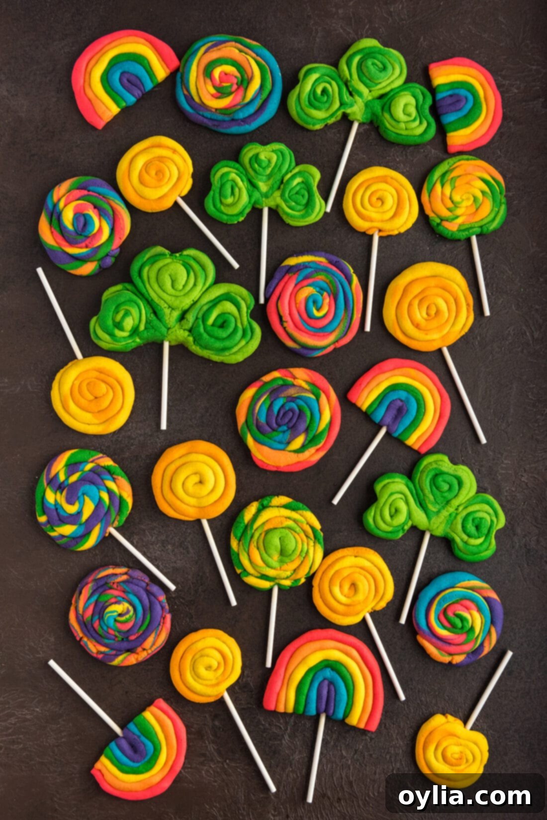 Assorted St. Patrick’s Day Cookies laying on a table, showcasing various shapes and colors.
