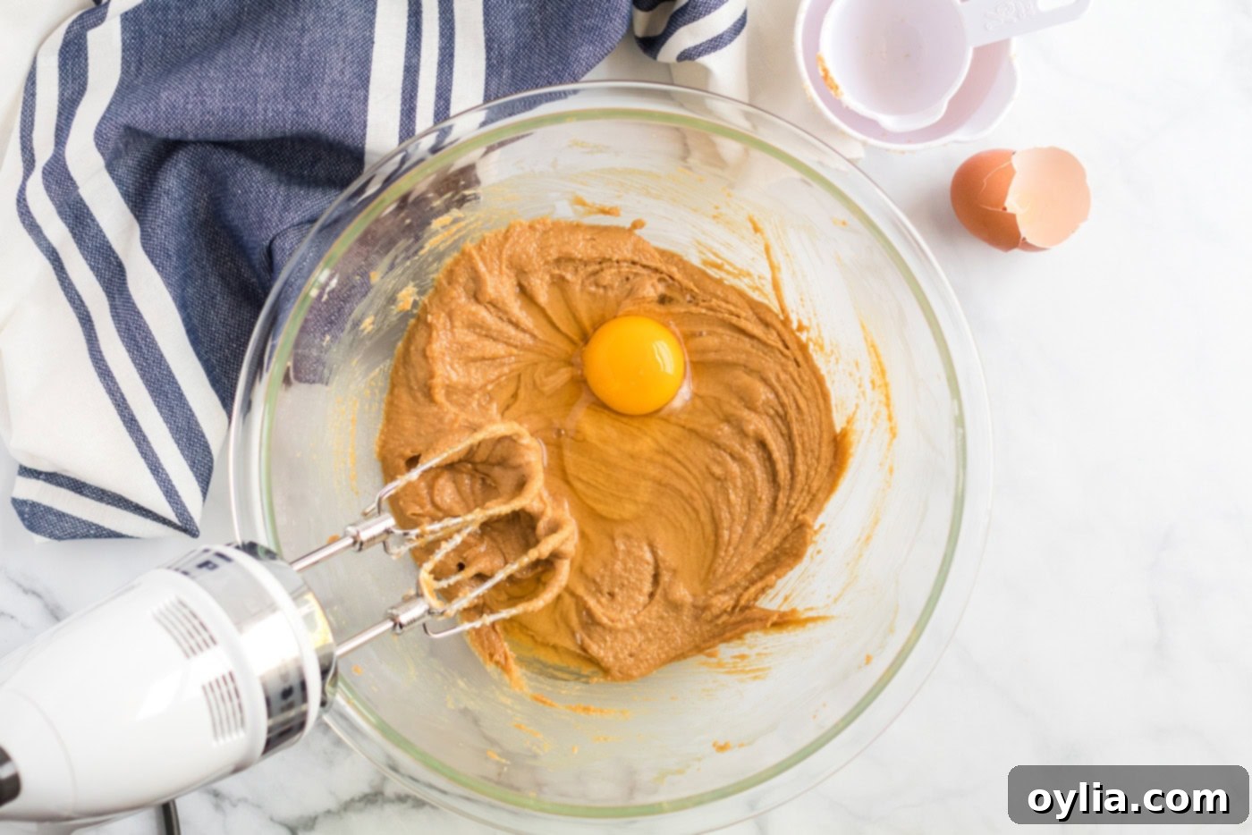 Egg being added to the creamed mixture