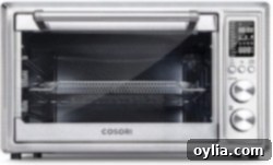 A Cosori Air Fryer Toaster Oven product image, showcasing its multi-function design.