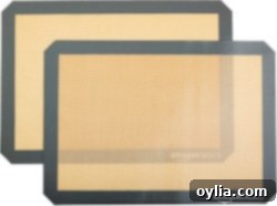 A close-up of a versatile silicone baking mat, showing its non-stick surface and flexibility.