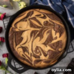 Close up photo of a Peanut Butter Marbled Brownie Skillet Pie