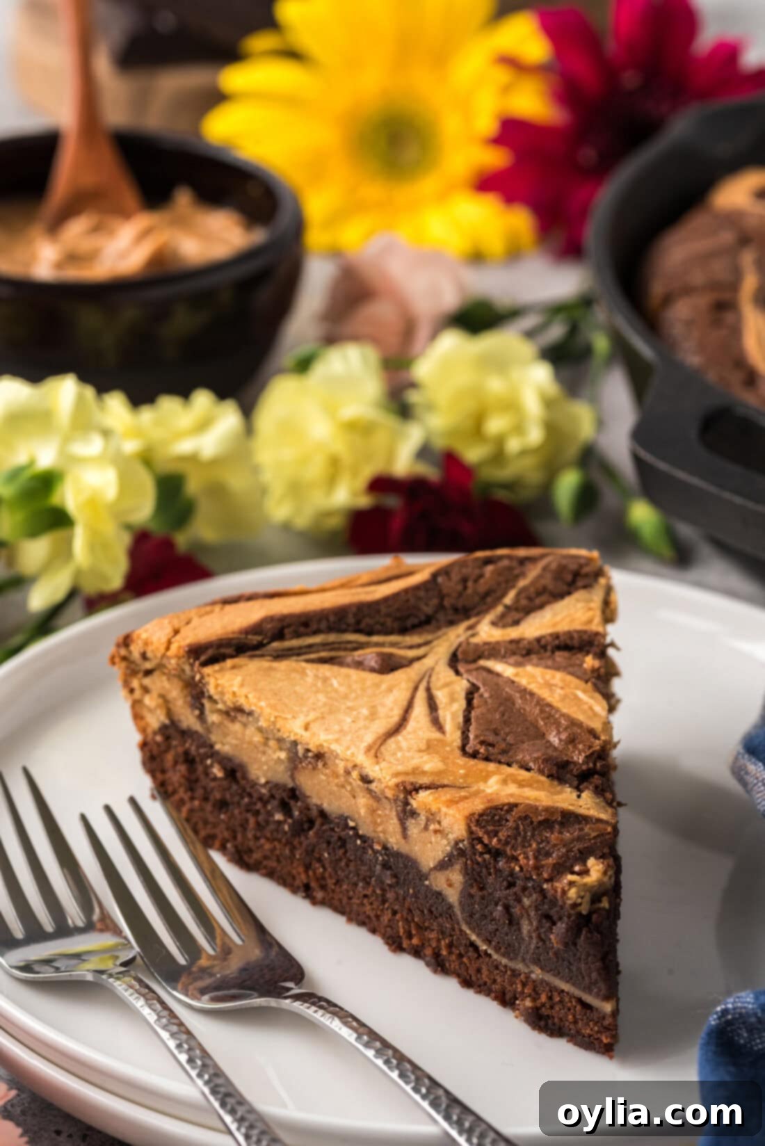 Slice of Peanut Butter Marbled Brownie Skillet Pie on a plate