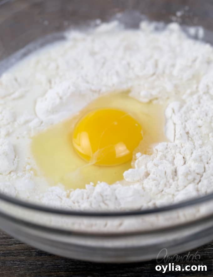 After whisking in milk, whisk the eggs in.