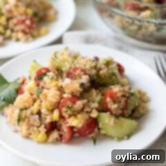 A vibrant and healthy quinoa salad served on a plate, ready to be enjoyed.