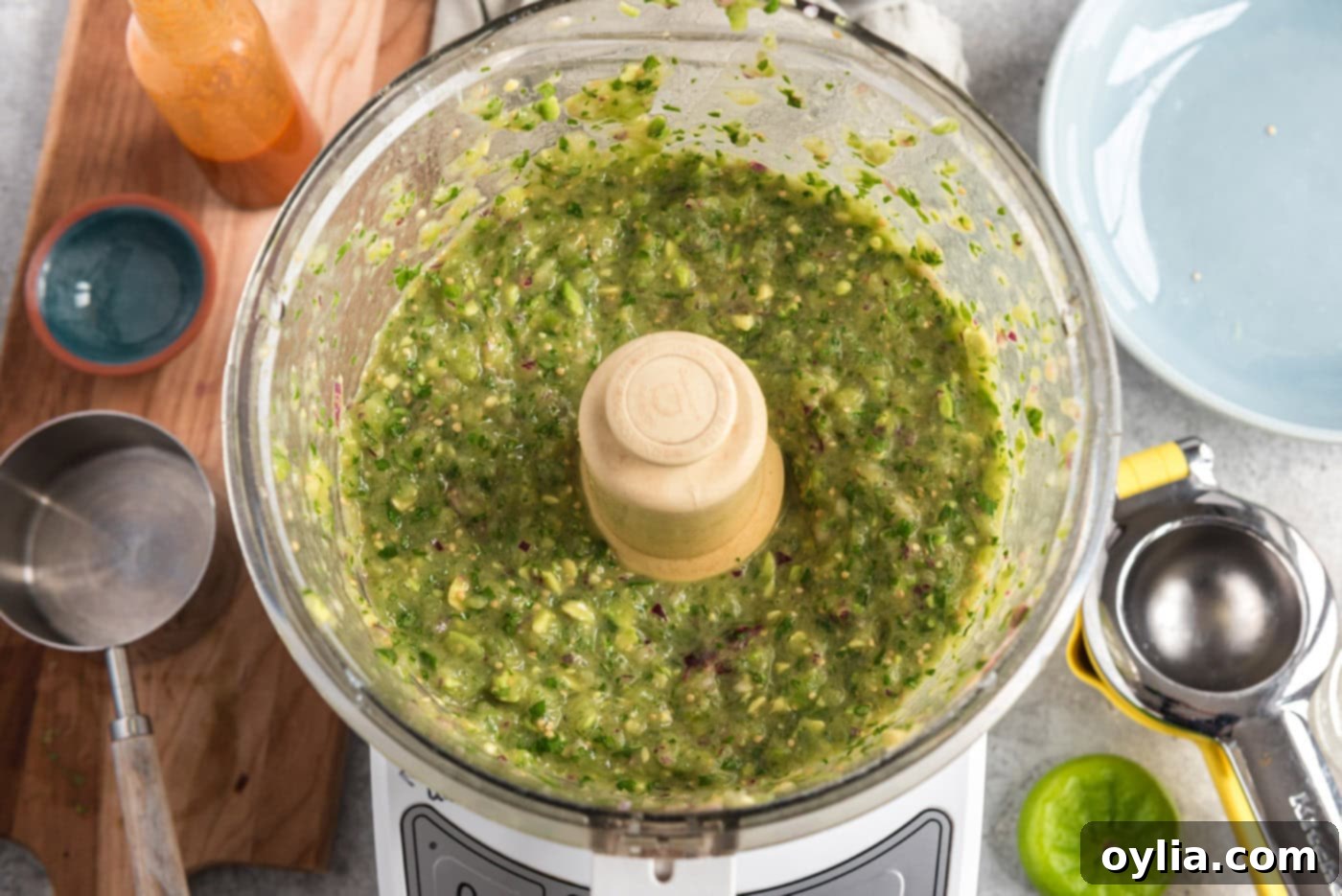 blitzed tomatillo avocado salsa in a food processor