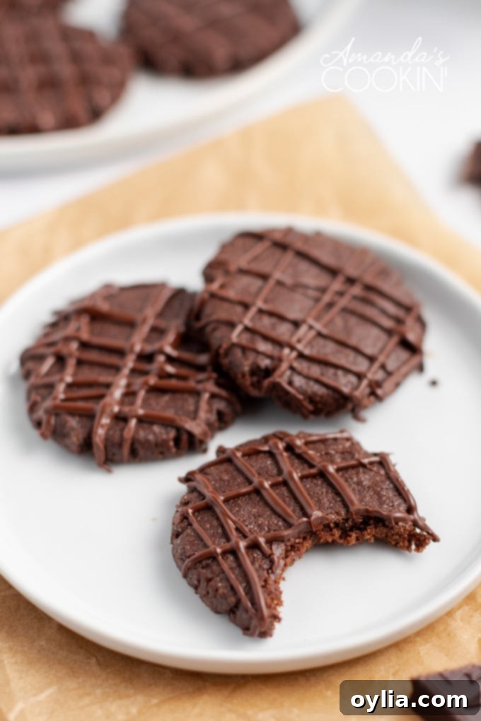 chocolate mint cookies on plate with a bite out of it