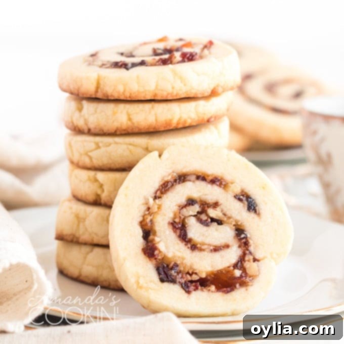 stack of festive cranberry orange spiral cookies