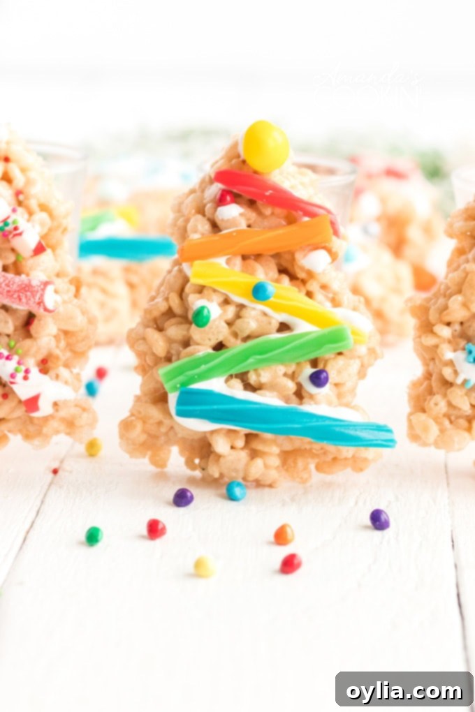 decorated Christmas tree rice krispie treat with colorful candies